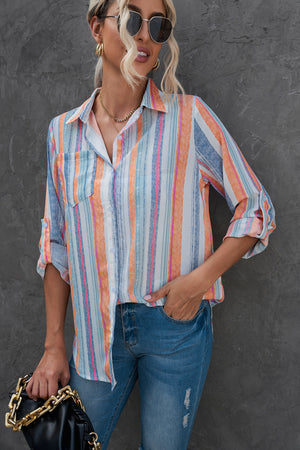 Coastal Stripe Button-Down Blouse in orange and blue with rolled sleeves and a chest pocket.