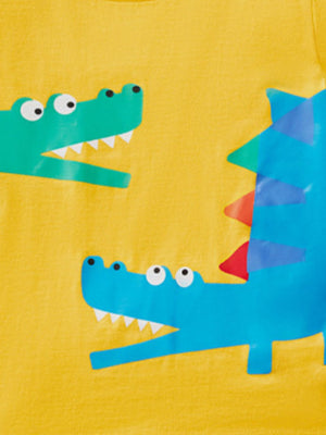 Toddler yellow cotton tee with blue and green crocodile print.