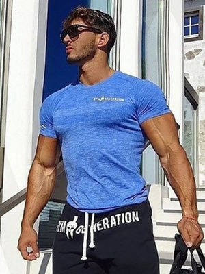 Blue performance knit t-shirt with crew neck and short sleeves, featuring subtle texture and chest logo.