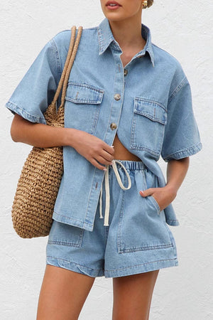 Light wash denim shirt and drawstring shorts set with button front and chest pockets.