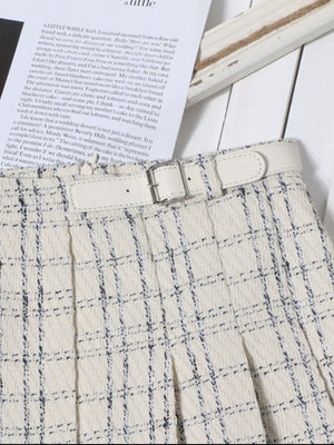 Beige plaid mini skirt with pleats and a white belt detail