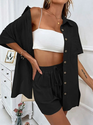 Black linen shirt and shorts set with drawstring shorts and button-up shirt.