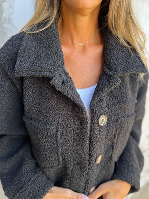 Textured Sherpa Utility Jacket in Black with button front and chest pockets.