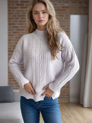 Textured cable knit mock neck sweater in light purple with detailed sleeves.