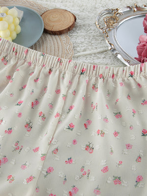 Floral lace trim cami and shorts set in cream with pink floral print and elastic waistband.