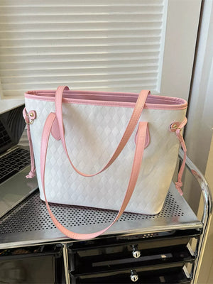 Textured diamond woven tote bag with pink trim and handles