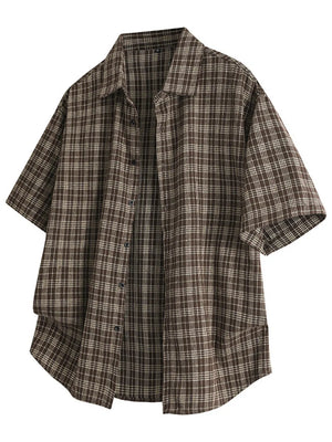 Classic oversized plaid button-front shirt in chocolate brown with short sleeves and a relaxed fit.