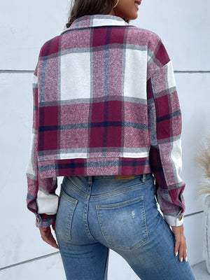 Checked plaid shacket in deep purple with patch pockets and button closure.