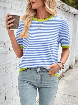 Striped knit tee with lime green trim and short sleeves, styled with jeans.