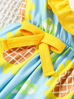 Baby one-piece with strawberry floral print, yellow ruffle trim, and bow detail.