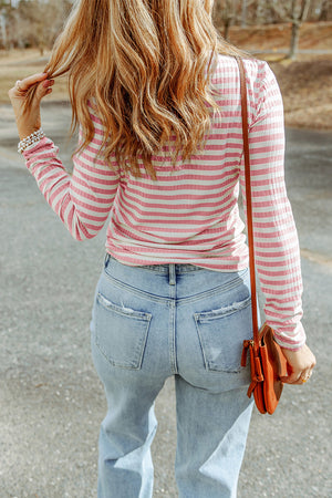 Ribbed turtleneck sweater in Stripe pink and white horizontal stripes, slim fit, long sleeves.