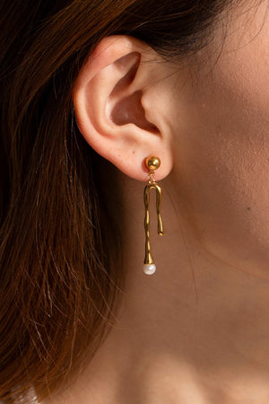 Gold abstract drip earrings with pearl detail
