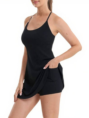 Black scoop neck cami activewear set with pocketed shorts.