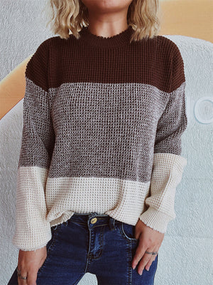 Colorblock textured knit pullover sweater with mock neck and long sleeves in brown, grey, and cream.