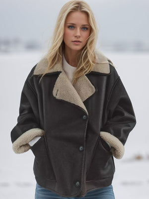 Oversized aviator jacket in chocolate brown with shearling trim and collar.