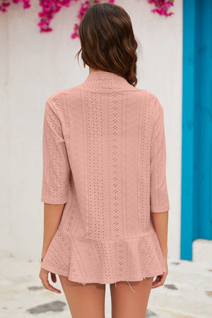 Blush pink perforated ruffle hem cardigan with 3/4 sleeves.