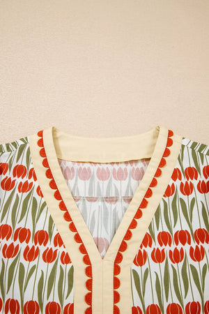 Cotton mini dress with vibrant red tulip print, V-neck and scalloped trim.