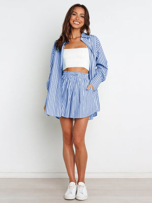Oversized blue and white striped shirting set with drawstring shorts and a white crop top.