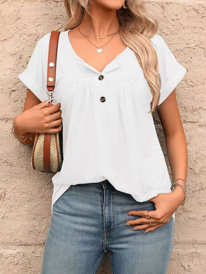 White relaxed henley t-shirt with button detail and cuffed sleeves.