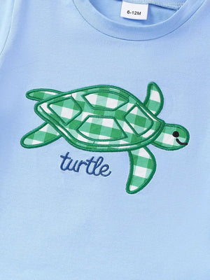Children's Turtle Round Neck Top And Gingham Shorts Set, close-up detail
