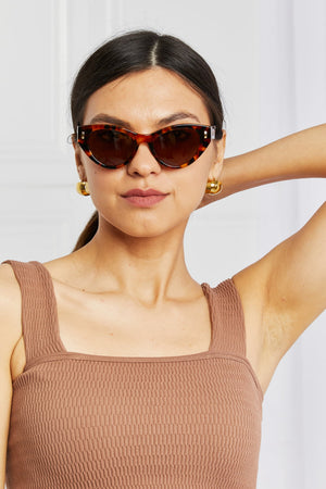 Cat-eye tortoise shell acetate sunglasses with bold frames