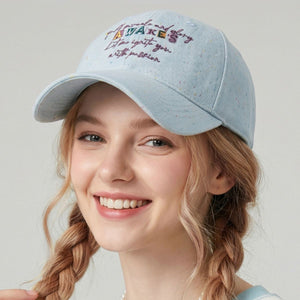 Light blue cotton baseball cap with embroidered text and curved brim
