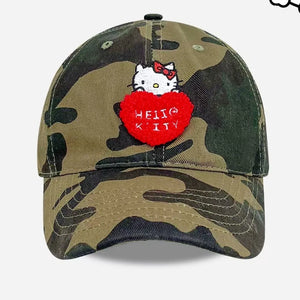Hello Kitty embroidered cotton baseball cap in camouflage with red heart detail.