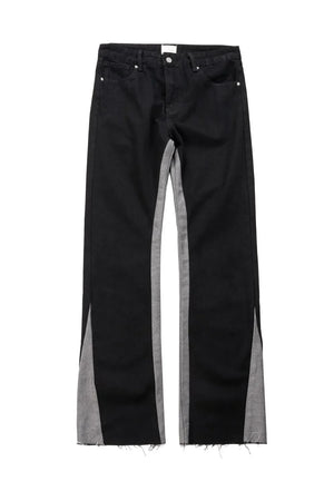 Black cotton bootcut jeans with contrast grey side panels and raw hems.