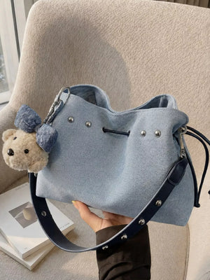 Bucket Crossbody Bag in Blue, close-up detail