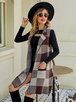 Geometric knit duster vest in brown and tan plaid with pockets.