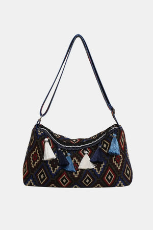Geometric embroidered shoulder bag with multi-colored tassels and patterned fabric