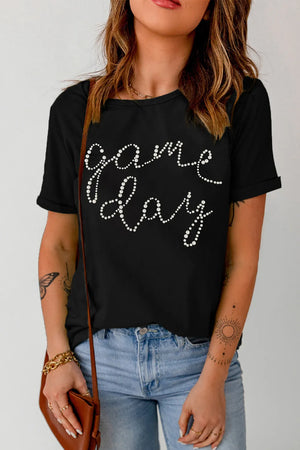Black t-shirt with white dot "Game Day" graphic, crew neck, short sleeves