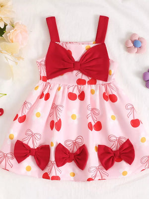 Pink cherry print baby dress with red bows and spaghetti straps.