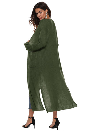 Longline knit cardigan in Army Green with side slits and pockets.