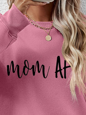 Mom At graphic sweatshirt in Blush Pink with crew neck and long sleeves.