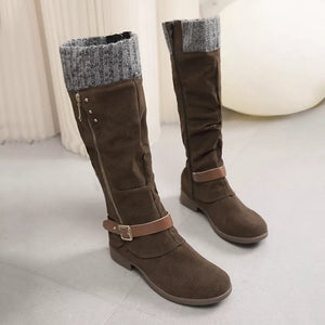 Brown suede knee-high slouch boots with grey knit detail and buckle strap.
