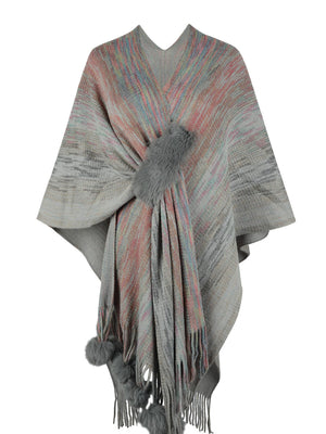 Knit wrap coat in grey with multi-color stripes and grey pom-pom details.