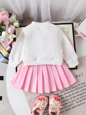 Children's Bow Button Up Cardigan And Pleated Skirt Set in Pink, fabric detail