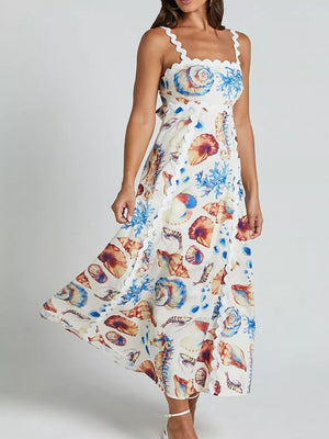 Seashell print midi dress with scalloped neckline and hem.