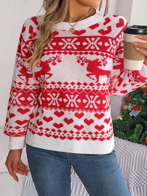 Red and white acrylic jacquard knit sweater with reindeer and heart pattern.
