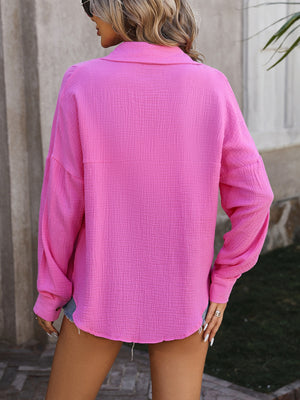 Pink textured cotton overshirt with relaxed silhouette and long sleeves.