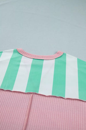 Oversized t-shirt with green and white stripes, pink ribbed bottom, and pink neckline.