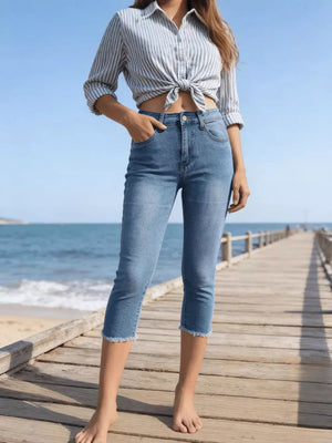 Sky blue cotton capris with raw hem and pockets.