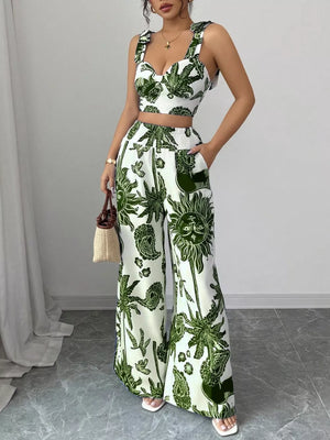 White and green tropical print crop top and wide-leg pants set with tie straps.