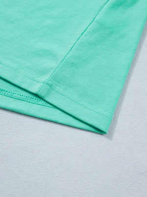 Eyelet lace ruffled cap sleeve top in mint green cotton blend fabric detail.