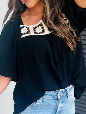 Black gauze puff sleeve blouse with crochet yoke detail