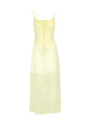 Apricot cami set with tie-front detail and a maxi skirt.