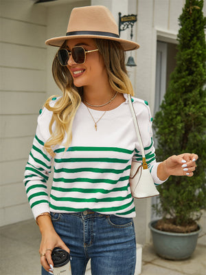 White and green striped acrylic sweater with shoulder buttons.