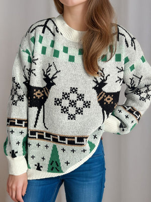 White acrylic knit sweater with reindeer, snowflake, and Christmas tree motif.
