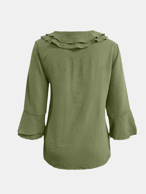 Olive green linen blouse with ruffled neckline and flared 3/4 sleeves.